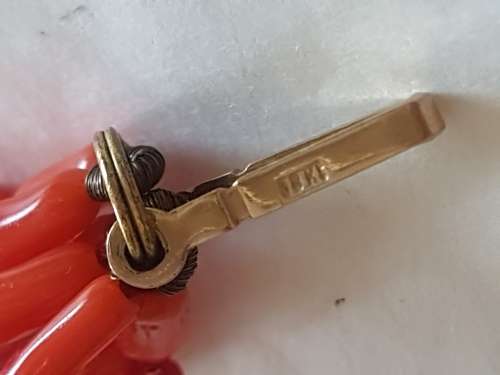 Vintage rice coral necklace with pretty bow shaped 18k gold clasp