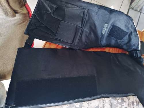 Paintball body armour with pod pack