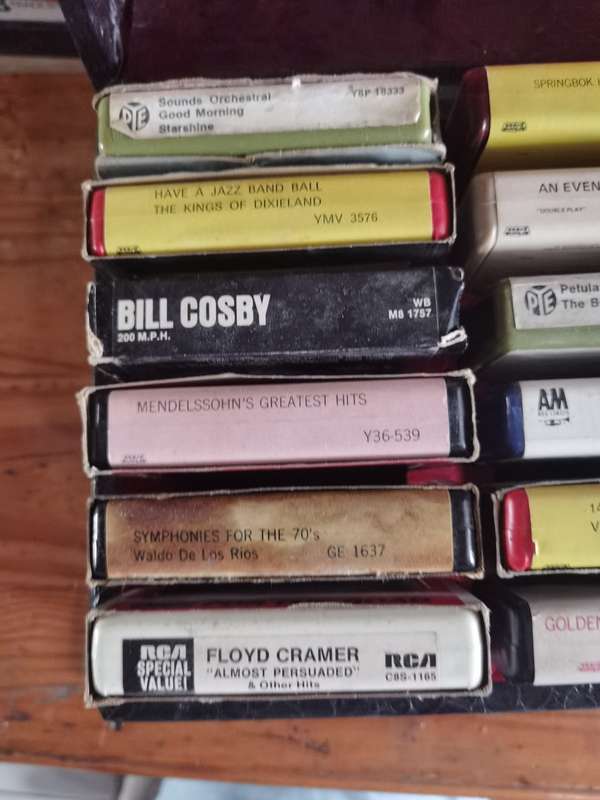 Vintage 8 track tapes x24  and lockable leather case