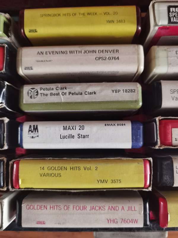 Vintage 8 track tapes x24  and lockable leather case