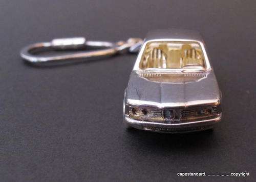 STIRLING SILVER KEY-RING  FEATURING VINTAGE MINIATURE  3-SERIES BMW MOTOR CAR .