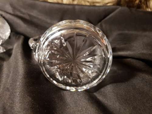 Set of fine cut crystal lidded sugar bowl and milk jug