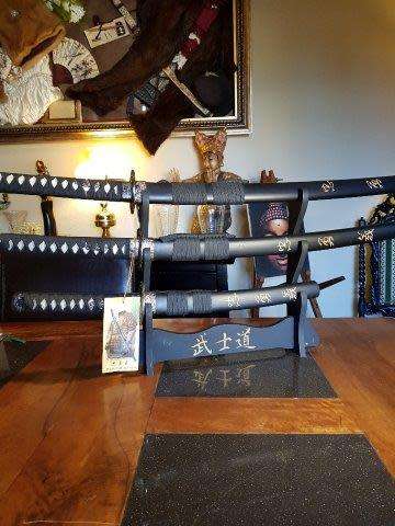 Set of 3 Last Samurai Swords with the Original Label on a Stand