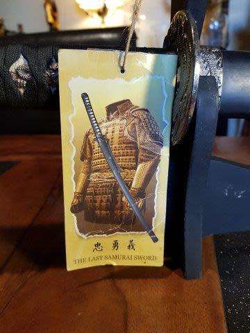 Set of 3 Last Samurai Swords with the Original Label on a Stand