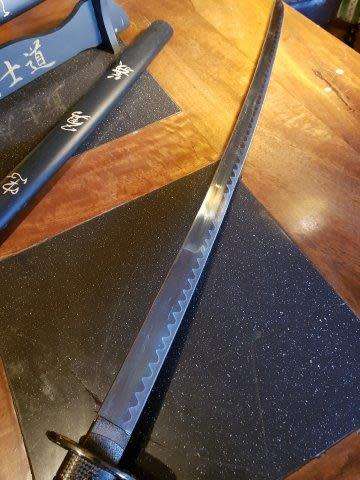 Set of 3 Last Samurai Swords with the Original Label on a Stand