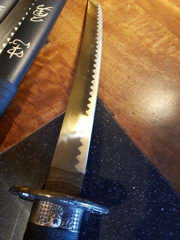 Set of 3 Last Samurai Swords with the Original Label on a Stand