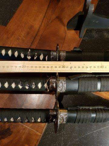 Set of 3 Last Samurai Swords with the Original Label on a Stand