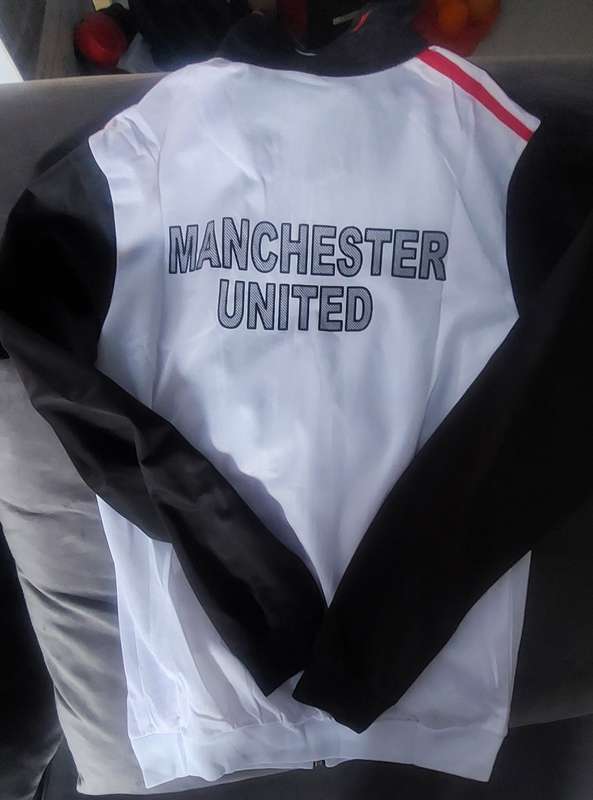 track suit top and bottom size medium