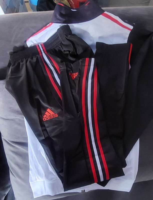 track suit top and bottom size medium