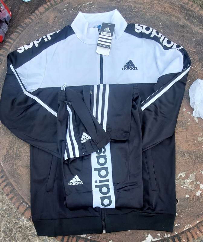 track suit top and bottom size medium