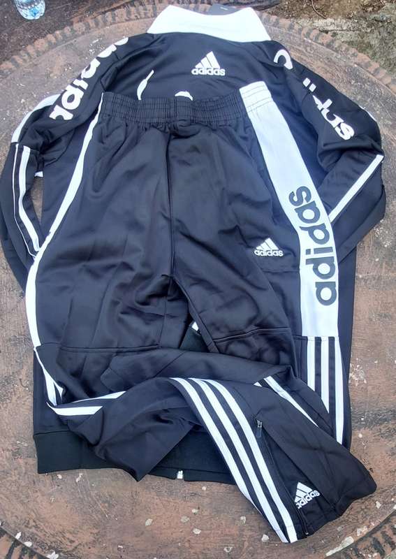 track suit top and bottom size medium