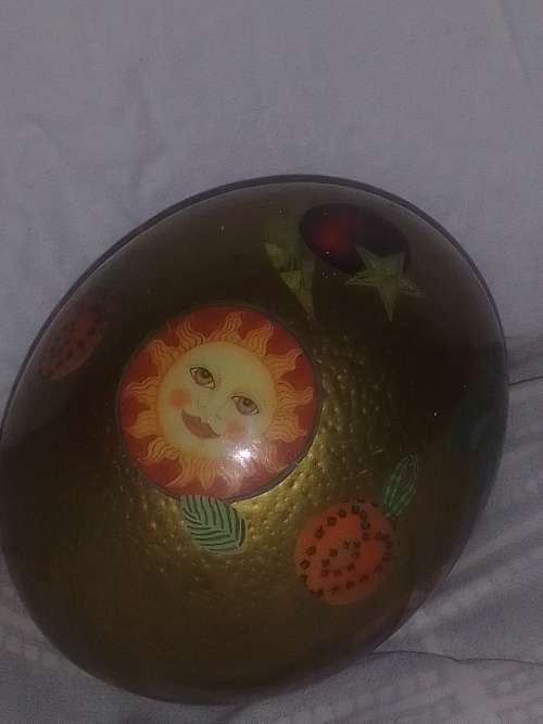 Genuine ostrich egg with detailed artwork.  Neatly kept .No cracks