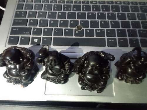Smiling Buddha set of 4. One bid for all