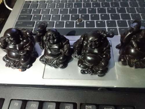 Smiling Buddha set of 4. One bid for all