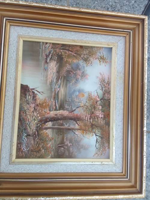 Oil on Board with lovely frame. Signed by artist