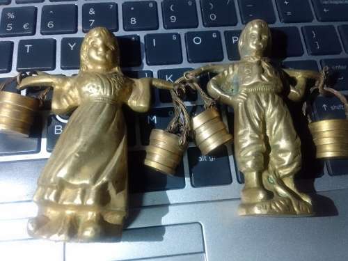 2 solid brass male and female figurines from Belgium.