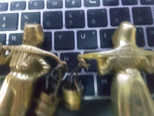 2 solid brass male and female figurines from Belgium.