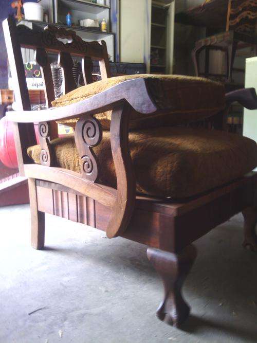 Solid imbuia chair from the side