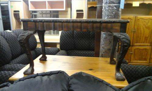 Unique Imbuia ball & claw coffee table