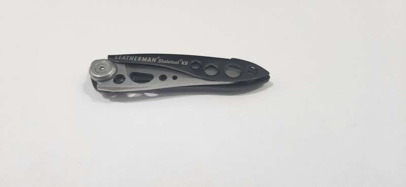 Leatherman Skeletool + olight torch