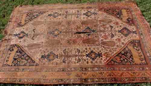 WORN OUT OLD HAND WOVEN CARPET - A BEAUTY IN ITS DAY NOW A REMNANT OF OLD PERSIA - CHARACTER PIECE!