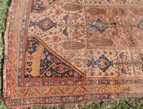 WORN OUT OLD HAND WOVEN CARPET - A BEAUTY IN ITS DAY NOW A REMNANT OF OLD PERSIA - CHARACTER PIECE!