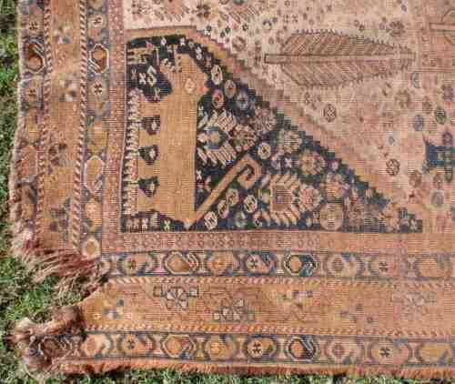 WORN OUT OLD HAND WOVEN CARPET - A BEAUTY IN ITS DAY NOW A REMNANT OF OLD PERSIA - CHARACTER PIECE!