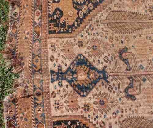 WORN OUT OLD HAND WOVEN CARPET - A BEAUTY IN ITS DAY NOW A REMNANT OF OLD PERSIA - CHARACTER PIECE!