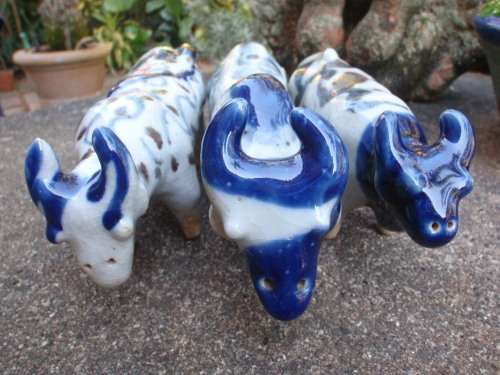 WONDERFUL and ARTY POTTERY CATTLE - BLUE DRIP GLAZED WITH HAND PAINTED DESIGNS - UNIQUE