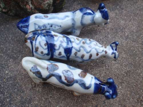 WONDERFUL and ARTY POTTERY CATTLE - BLUE DRIP GLAZED WITH HAND PAINTED DESIGNS - UNIQUE