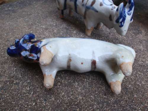 WONDERFUL and ARTY POTTERY CATTLE - BLUE DRIP GLAZED WITH HAND PAINTED DESIGNS - UNIQUE
