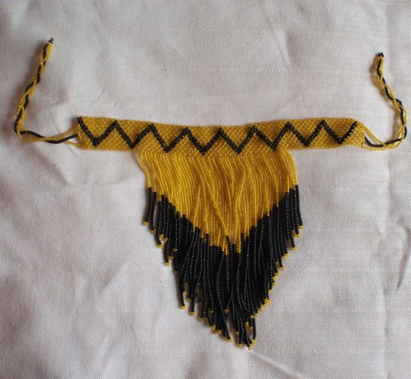 Authentic Zulu beadwork - expertly hand made with gold colour glass beads contrasted with black.