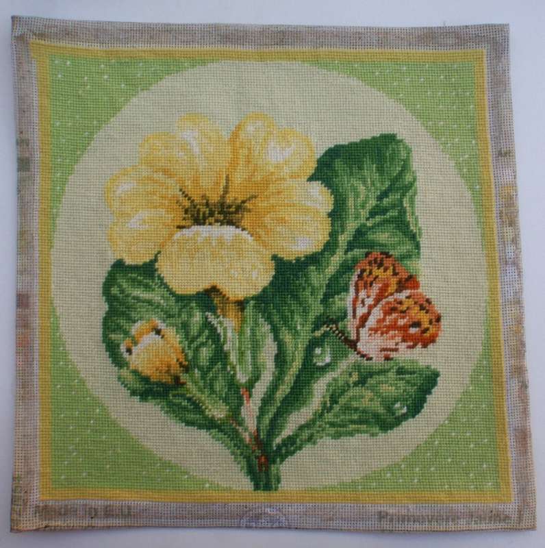 Tapestry. Loose tapestry. Beautiful summer garden scene. Primroses with Butterfly. Lovely condition.