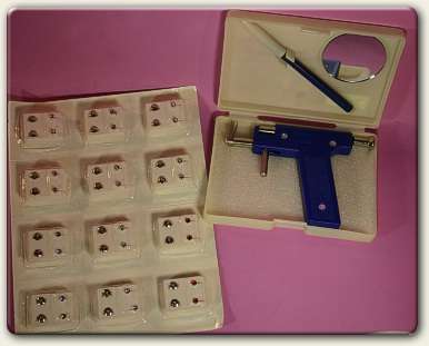 Earpiercing Gun & 6 earring studs