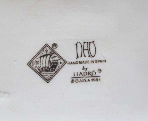 Lladro Nao Daisa Porcelain Figurine Girl Playing with Doll on Armchair Chair