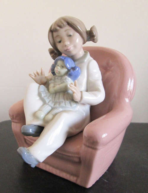 Lladro Nao Daisa Porcelain Figurine Girl Playing with Doll on Armchair Chair