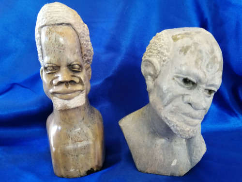 Quality vintage hand carved African men stone sculptures