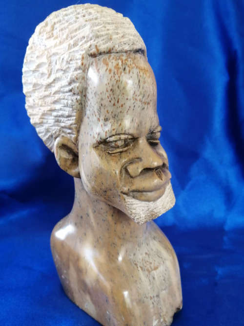 Quality vintage hand carved African men stone sculptures