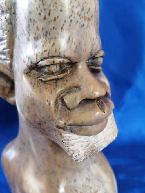 Quality vintage hand carved African men stone sculptures