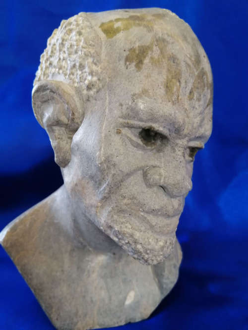 Quality vintage hand carved African men stone sculptures