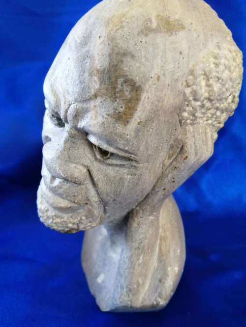 Quality vintage hand carved African men stone sculptures