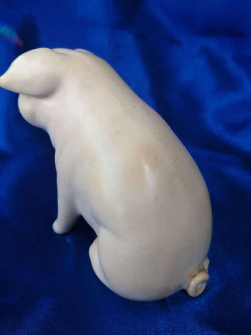 Very old sitting cream / pink pig  signed S. Bass