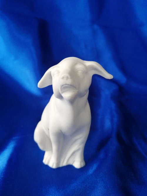Old Bisque Pig Sitting