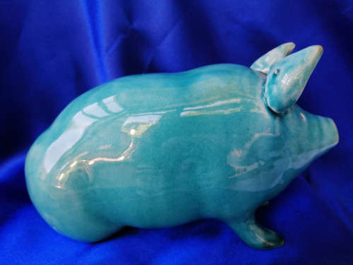 Vintage Turquoise glazed pottery pig in the style of Wemyss