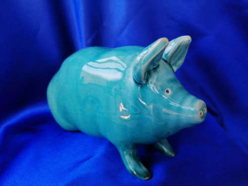 Vintage Turquoise glazed pottery pig in the style of Wemyss