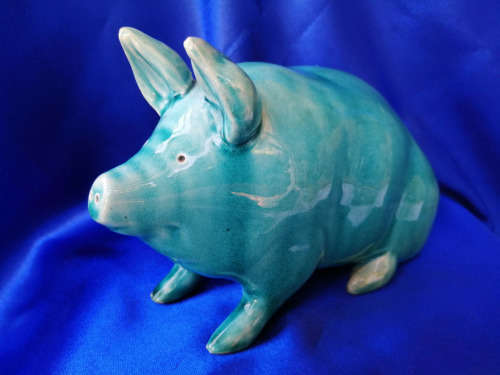 Vintage Turquoise glazed pottery pig in the style of Wemyss