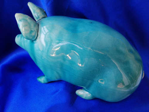 Vintage Turquoise glazed pottery pig in the style of Wemyss