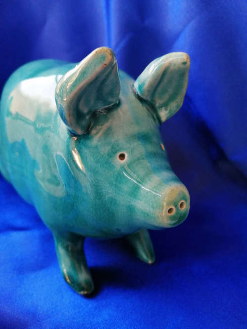 Vintage Turquoise glazed pottery pig in the style of Wemyss
