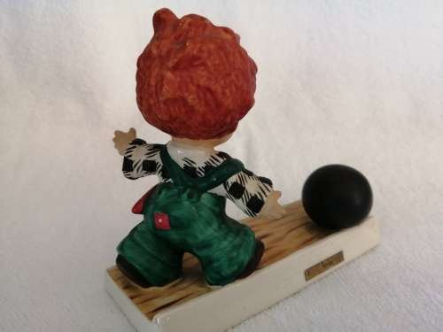 Goebel red head figurine Boy with Ball, Strike
