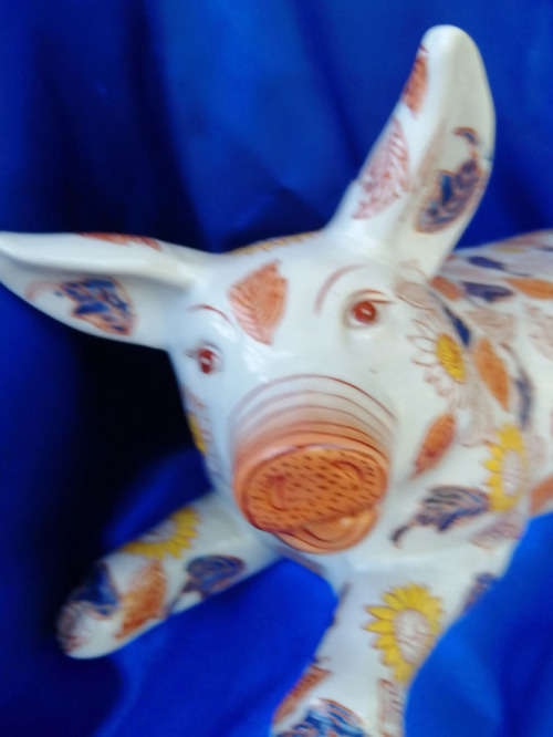 Giant Japanese red enameled porcelain boar or pig and two smaller pigs*
